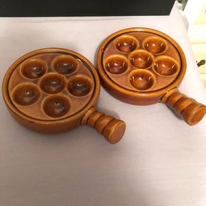 2 escargot dishes